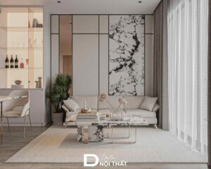 Vách tivi ốp đá marble nổi bật trên nền trung tính, giúp không gian thêm chiều sâu và đẳng cấp