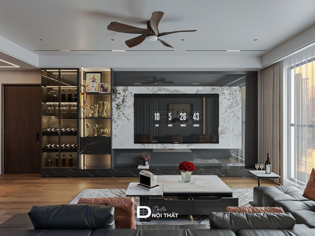 Thiết kế nội thất phòng khách hiện đại với sofa da góc L màu đen và vách tivi ốp đá marble sang trọng.